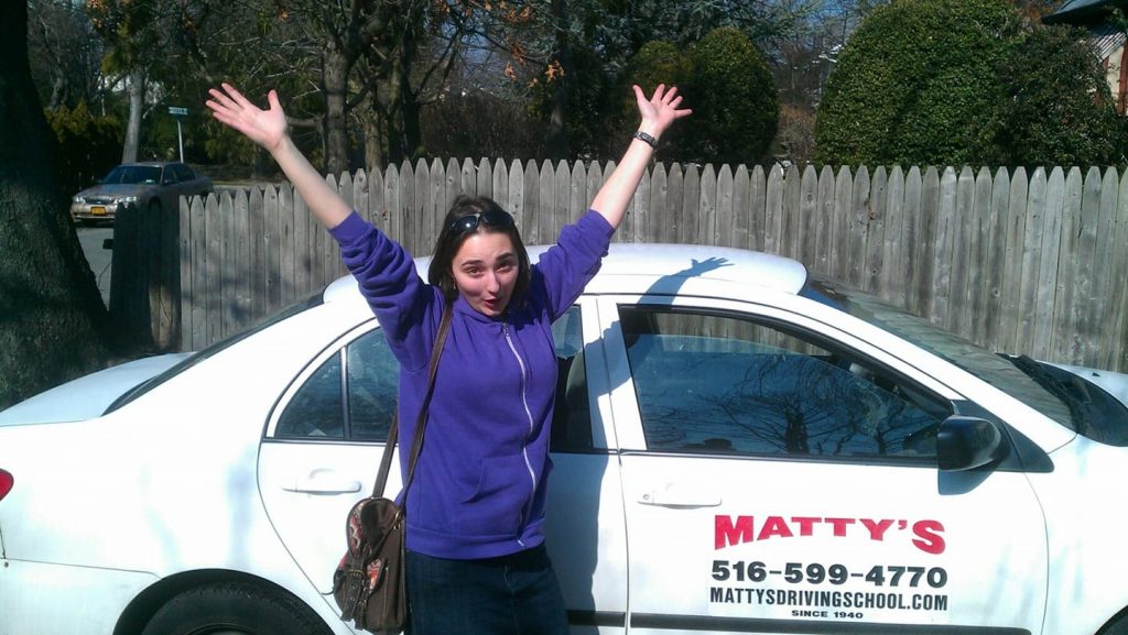 Excited teen driver celebrating another successful passing of our 5 hour driving class.